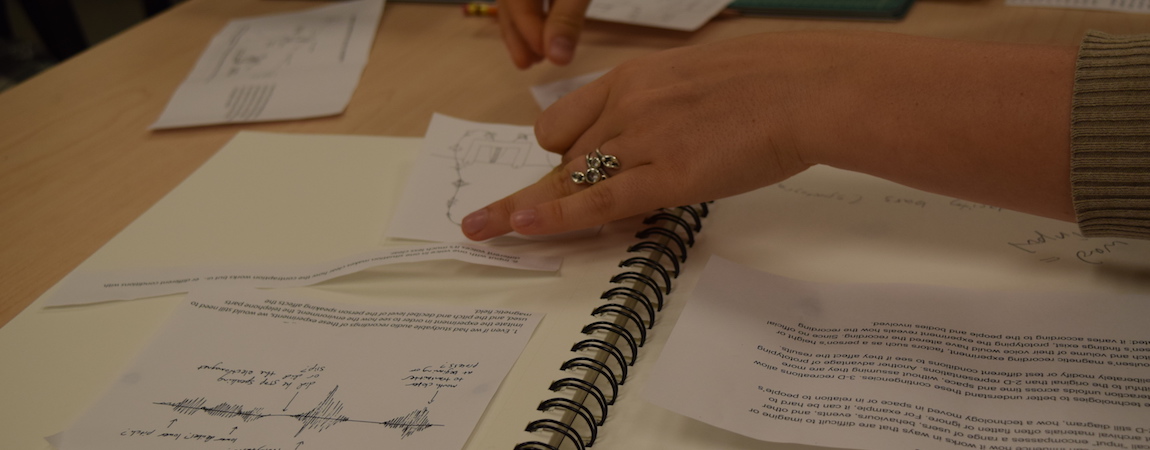 Kat Piecing Together the Book