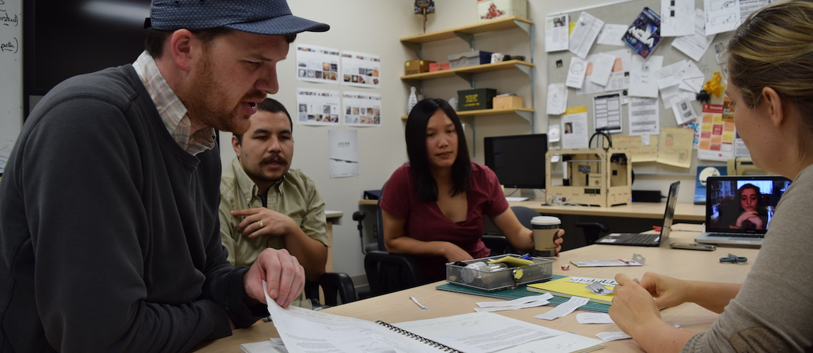 The MLab Team Discussing How to Explain the Prototyping Process to a Broad Audience