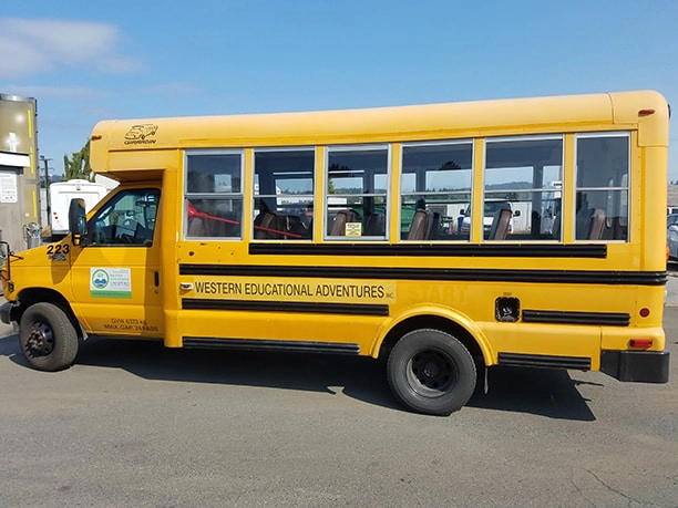 A small yellow school bus.