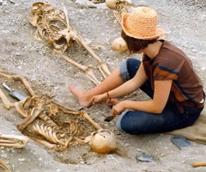 A pompous professor reading a book
